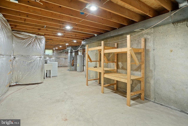 15108 Plum Tree Way, Bowie, MD 20721 - unfinished below grade area with gas water heater, heating unit, and washer / dryer