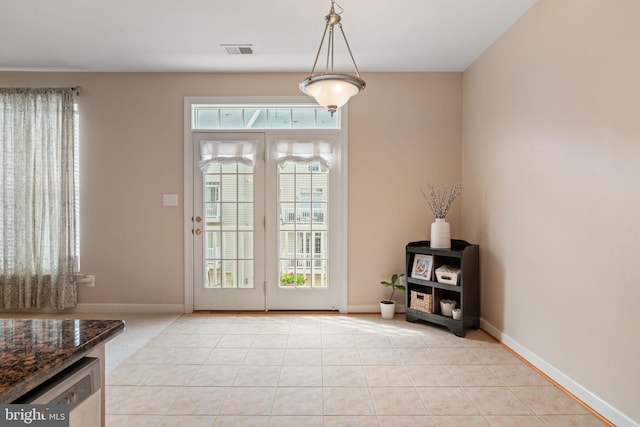 15196 Lancashire Dr, Woodbridge, VA 22191 - doorway with light tile patterned floors and baseboards