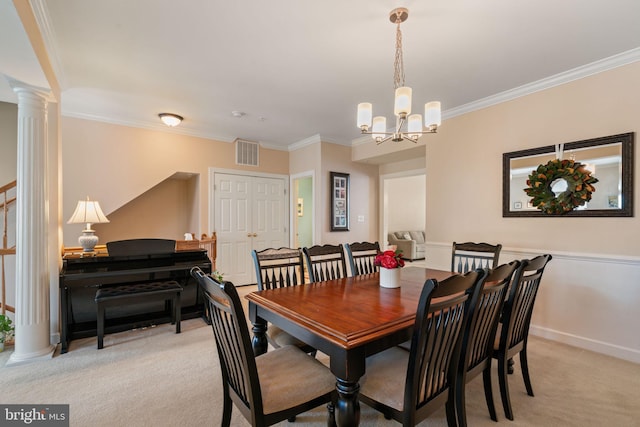15196 Lancashire Dr, Woodbridge, VA 22191 - dining room with crown molding, light colored carpet, ornate columns, and a chandelier