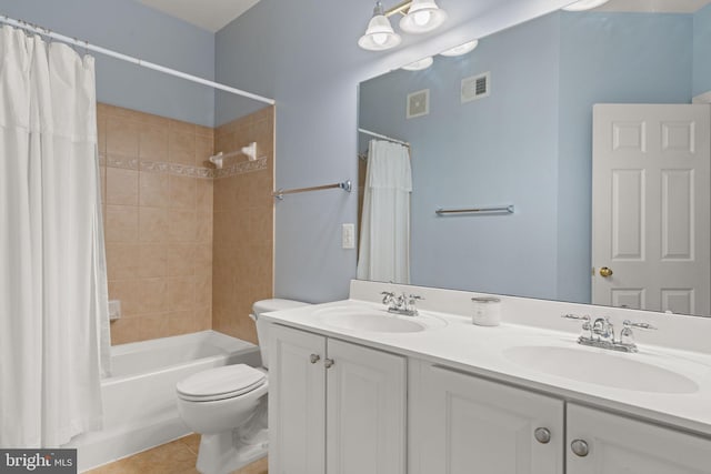 15196 Lancashire Dr, Woodbridge, VA 22191 - full bath featuring double vanity, shower / bath combo with shower curtain, and tile patterned floors