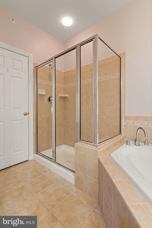 15196 Lancashire Dr, Woodbridge, VA 22191 - bathroom featuring a garden tub, a stall shower, and tile patterned flooring