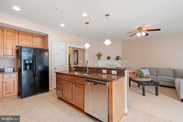 15196 Lancashire Dr, Woodbridge, VA 22191 - kitchen with black refrigerator with ice dispenser, stainless steel dishwasher, ceiling fan, open floor plan, and dark stone countertops