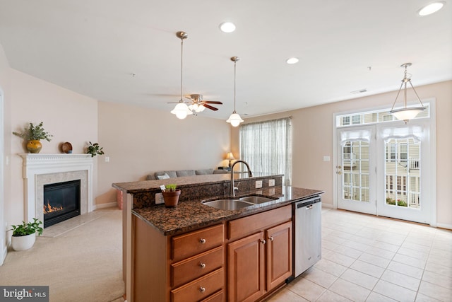 15196 Lancashire Dr, Woodbridge, VA 22191 - kitchen with stainless steel dishwasher, open floor plan, ceiling fan, pendant lighting, and dark stone counters