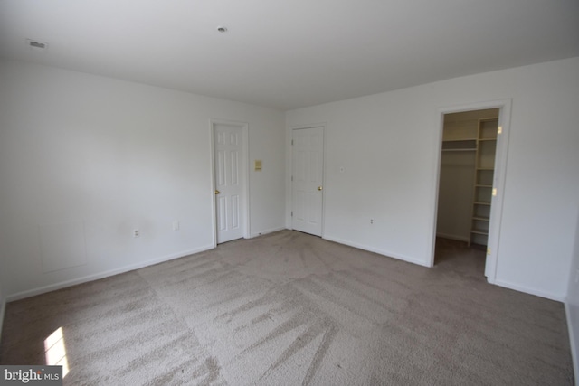 104 Rock Creek Ct, Frederick, MD 21702 - unfurnished bedroom featuring carpet flooring and a spacious closet