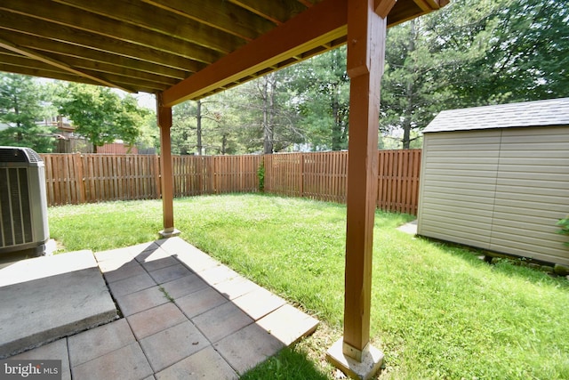 104 Rock Creek Ct, Frederick, MD 21702 - fenced backyard featuring a patio and a storage unit