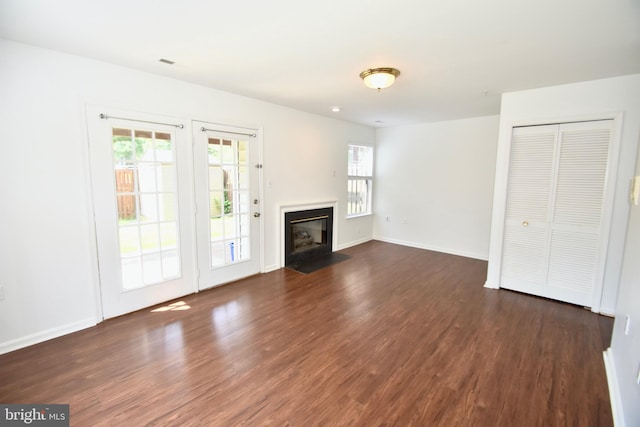 104 Rock Creek Ct, Frederick, MD 21702 - unfurnished living room featuring wood finished floors and a fireplace with flush hearth