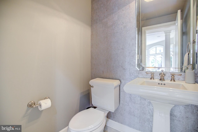 22966 Lois, Brambleton, VA 20148 - bathroom with toilet and baseboards