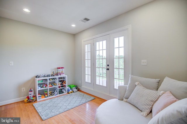 22966 Lois, Brambleton, VA 20148 - doorway featuring hardwood / wood-style flooring, recessed lighting, and french doors