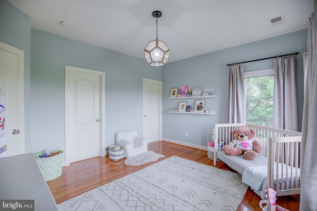 22966 Lois, Brambleton, VA 20148 - bedroom with wood finished floors and baseboards