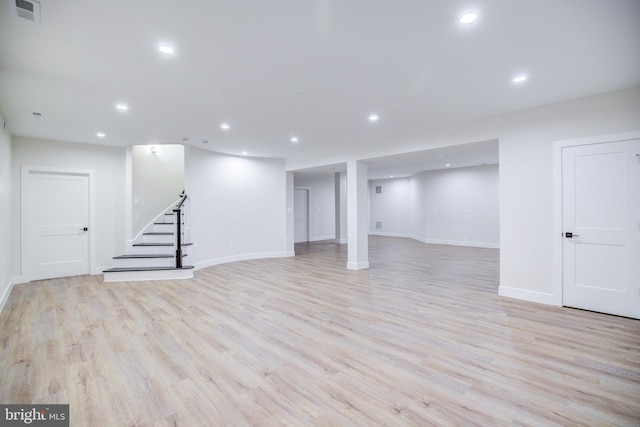 22966 Lois, Brambleton, VA 20148 - finished basement with stairway, recessed lighting, and light wood-type flooring