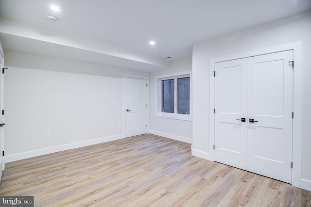 22966 Lois, Brambleton, VA 20148 - below grade area featuring light wood-style floors and recessed lighting