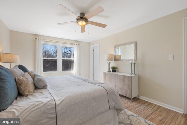17105 Amity Dr, Derwood, MD 20855 - bedroom with light wood-style flooring and a ceiling fan