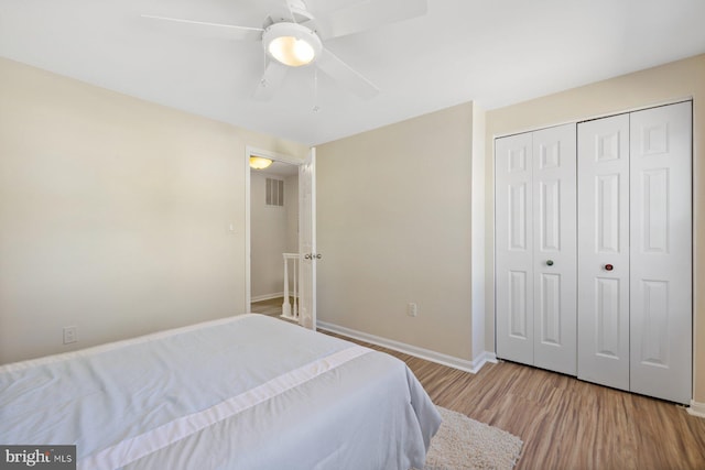 17105 Amity Dr, Derwood, MD 20855 - bedroom with wood finished floors, a closet, and a ceiling fan