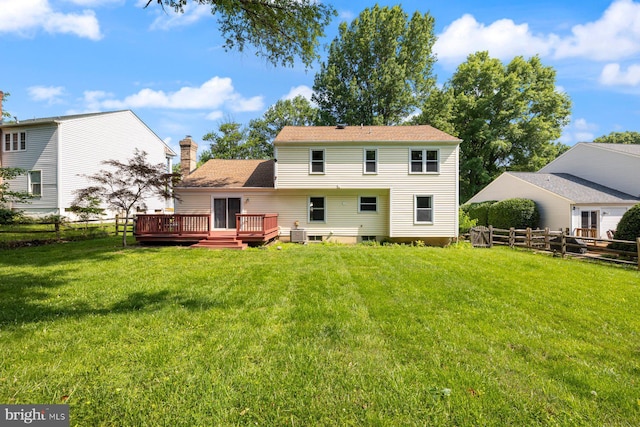 17105 Amity Dr, Derwood, MD 20855 - rear view of house with a deck and a chimney