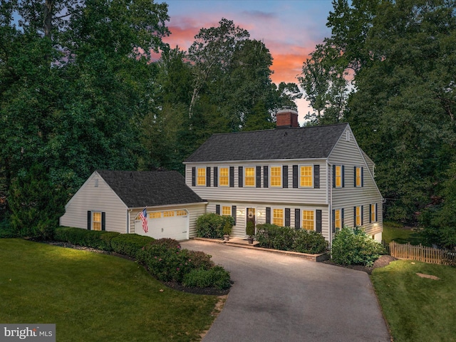 994 Bayberry Dr, Arnold, MD 21012 - view of front of home featuring driveway, an attached garage, a chimney, and roof with shingles