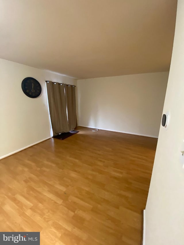 14004 Daleshire Way Unit 49, Burtonsville, MD 20866 - spare room with light wood-type flooring and baseboards