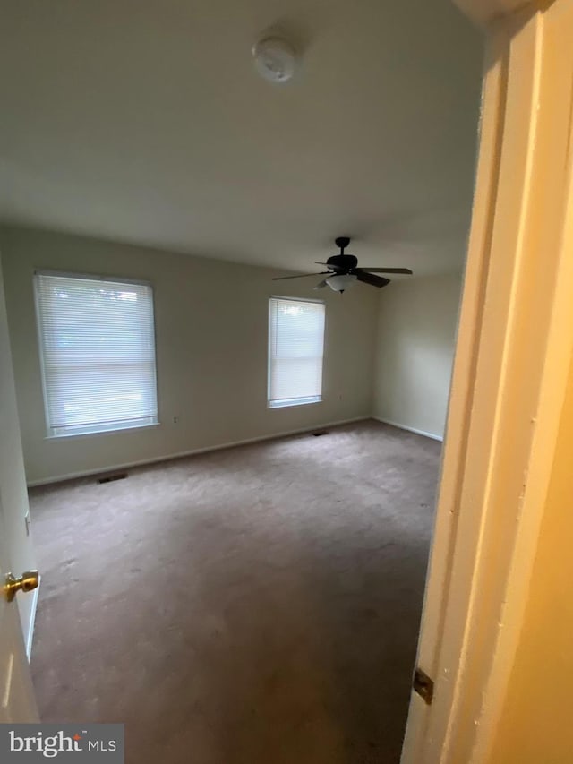 14004 Daleshire Way Unit 49, Burtonsville, MD 20866 - spare room featuring carpet and a ceiling fan