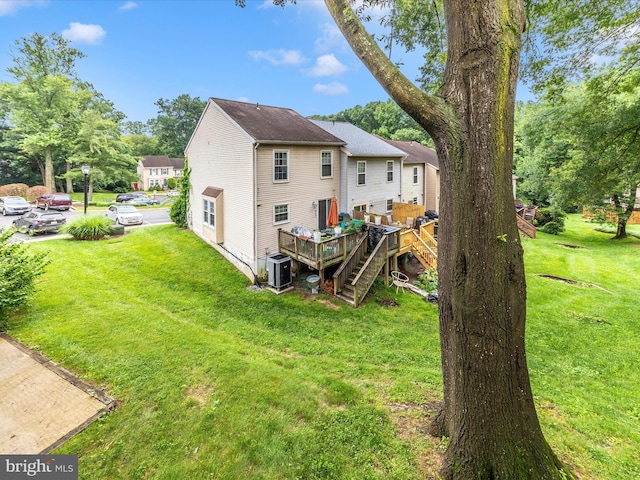 14004 Daleshire Way Unit 49, Burtonsville, MD 20866 - rear view of property with a deck and a lawn
