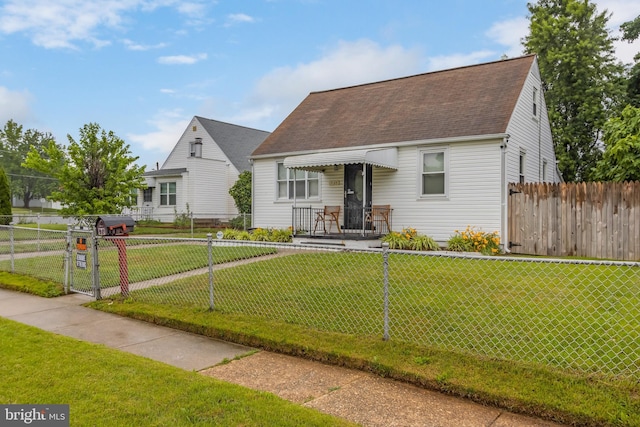 7135 Railway, Dundalk, MD 21222 - view of front facade featuring roof with shingles and a gate