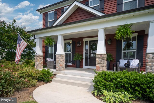 115 Saddle Ridge Ln, Fredericksburg, VA 22406 - doorway to property featuring covered porch and stone siding