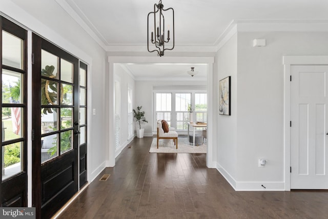 115 Saddle Ridge Ln, Fredericksburg, VA 22406 - entryway with dark wood-type flooring, a chandelier, and crown molding