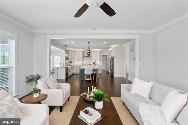 115 Saddle Ridge Ln, Fredericksburg, VA 22406 - living room featuring plenty of natural light, dark wood-style floors, recessed lighting, a ceiling fan, and crown molding