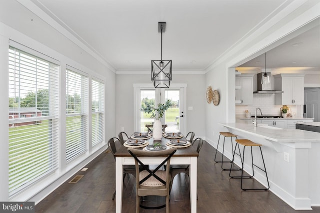 115 Saddle Ridge Ln, Fredericksburg, VA 22406 - dining room featuring dark wood-type flooring and ornamental molding