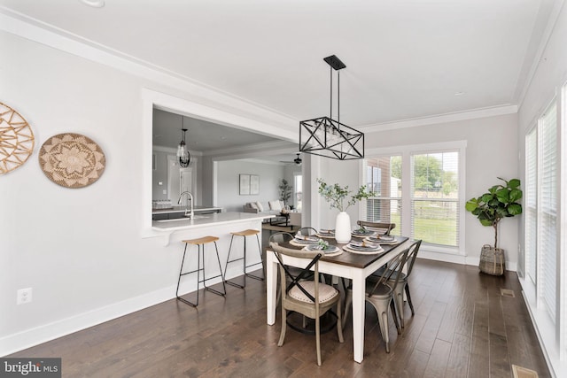 115 Saddle Ridge Ln, Fredericksburg, VA 22406 - dining space with ornamental molding and dark wood-style floors
