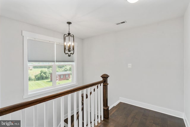 115 Saddle Ridge Ln, Fredericksburg, VA 22406 - corridor with an upstairs landing, a chandelier, and dark wood-style flooring