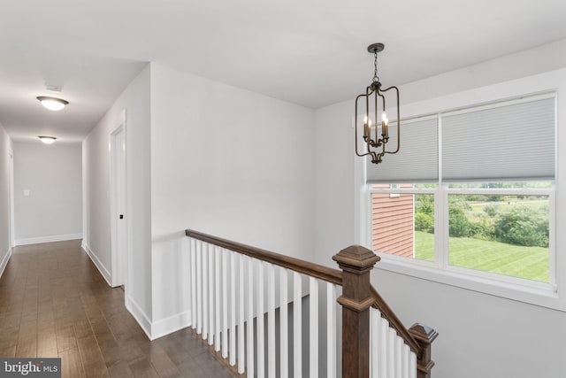 115 Saddle Ridge Ln, Fredericksburg, VA 22406 - corridor with a chandelier, an upstairs landing, and dark wood-type flooring