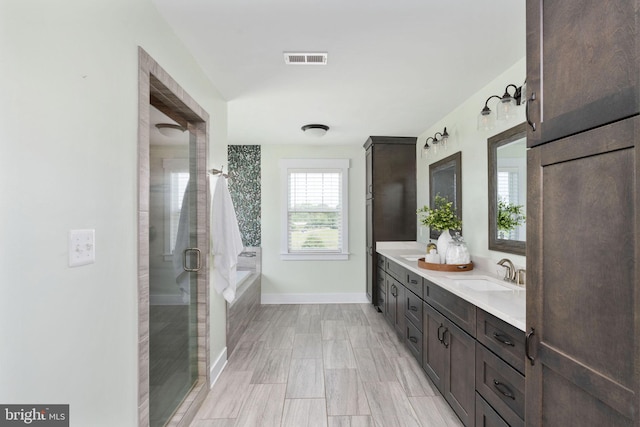 115 Saddle Ridge Ln, Fredericksburg, VA 22406 - full bath with double vanity, a bath, and a stall shower