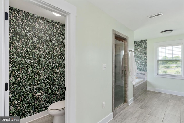 115 Saddle Ridge Ln, Fredericksburg, VA 22406 - full bathroom with a garden tub, wallpapered walls, and a stall shower