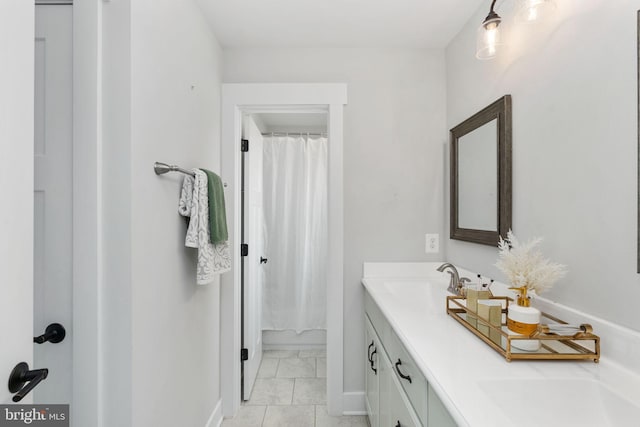 115 Saddle Ridge Ln, Fredericksburg, VA 22406 - full bath featuring double vanity, marble look tiles, and a shower with shower curtain