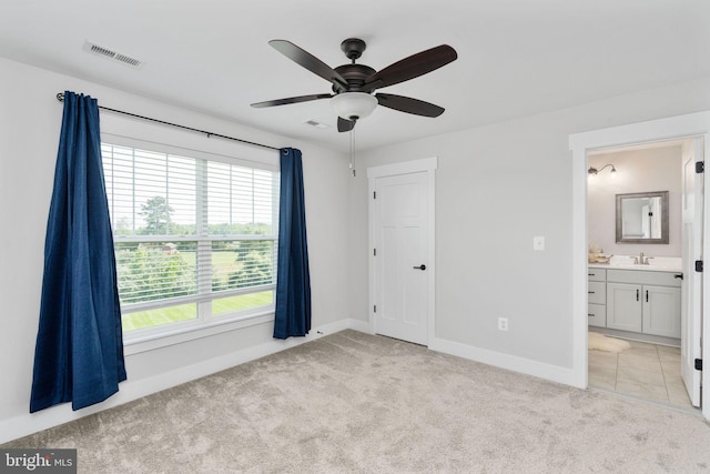115 Saddle Ridge Ln, Fredericksburg, VA 22406 - unfurnished bedroom with light carpet, ensuite bathroom, and ceiling fan