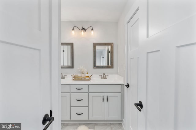 115 Saddle Ridge Ln, Fredericksburg, VA 22406 - bathroom with double vanity and marble look tile flooring