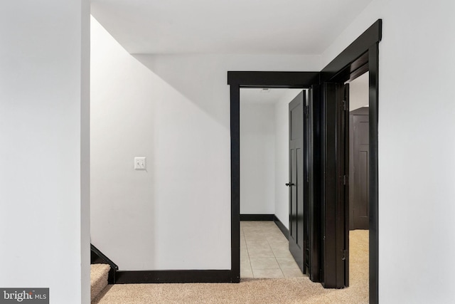 115 Saddle Ridge Ln, Fredericksburg, VA 22406 - hallway featuring light carpet and light tile patterned floors