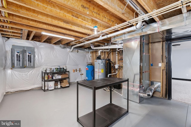 115 Saddle Ridge Ln, Fredericksburg, VA 22406 - unfinished below grade area with electric panel, gas water heater, a water pressure tank, and heating unit