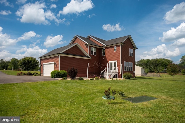115 Saddle Ridge Ln, Fredericksburg, VA 22406 - traditional home featuring asphalt driveway, a garage, and a front lawn