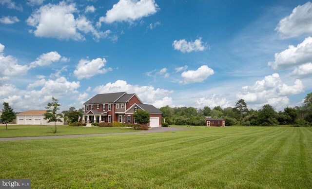 115 Saddle Ridge Ln, Fredericksburg, VA 22406 - view of front facade featuring an attached garage, driveway, and a front yard
