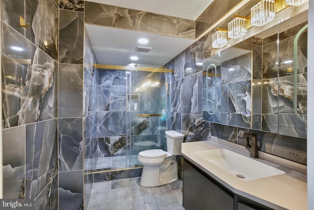 3701 S George Mason Dr Unit 205N, Falls Church, VA 22041 - bathroom with tile walls, vanity, and a stall shower
