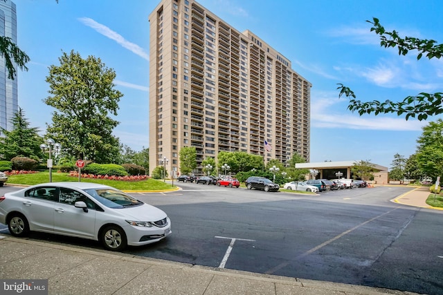 3701 S George Mason Dr Unit 205N, Falls Church, VA 22041 - view of building exterior with uncovered parking