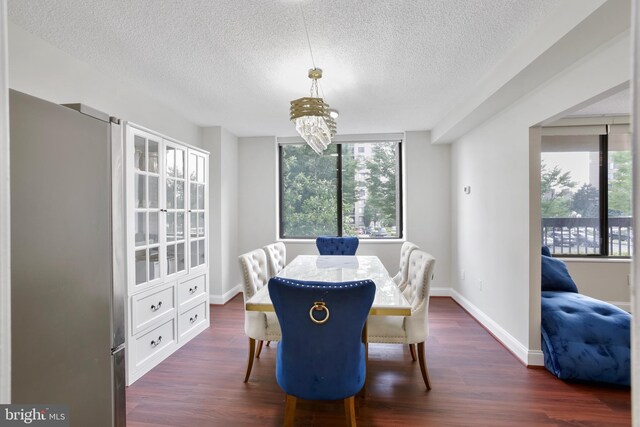 3701 S George Mason Dr Unit 205N, Falls Church, VA 22041 - dining area with a textured ceiling and dark wood-type flooring