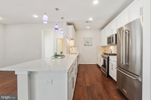 3989 Norton Pl Unit 207, Fairfax, VA 22030 - kitchen with high end appliances, backsplash, light stone countertops, recessed lighting, and white cabinetry