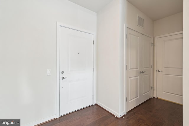 3989 Norton Pl Unit 207, Fairfax, VA 22030 - hallway featuring dark wood finished floors and baseboards