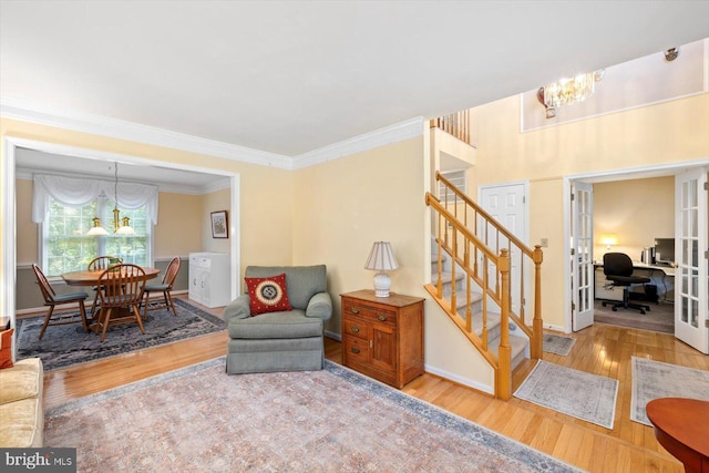10 Frantz Ct, Fredericksburg, VA 22405 - sitting room with a chandelier, wood finished floors, stairway, and crown molding