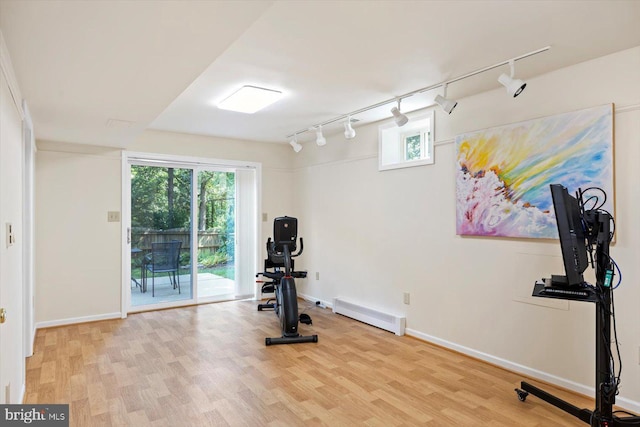 10 Frantz Ct, Fredericksburg, VA 22405 - workout room with track lighting, wood finished floors, a baseboard radiator, and healthy amount of natural light