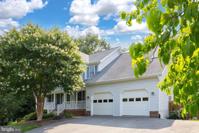 10 Frantz Ct, Fredericksburg, VA 22405 - view of front of home featuring a porch, a garage, asphalt driveway, and roof with shingles