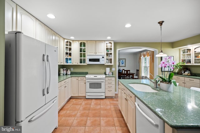 9100 Quarter Ct, Vienna, VA 22182 - kitchen featuring white appliances, arched walkways, light tile patterned floors, pendant lighting, and recessed lighting