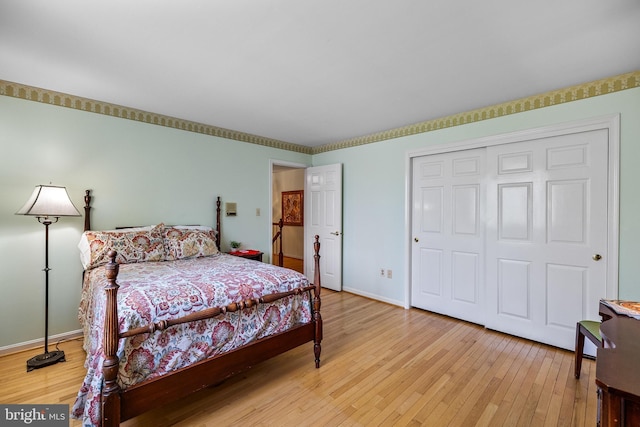 9100 Quarter Ct, Vienna, VA 22182 - bedroom with light wood finished floors and a closet