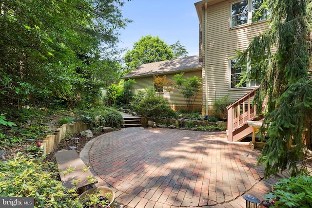 9100 Quarter Ct, Vienna, VA 22182 - wooden terrace featuring a patio area